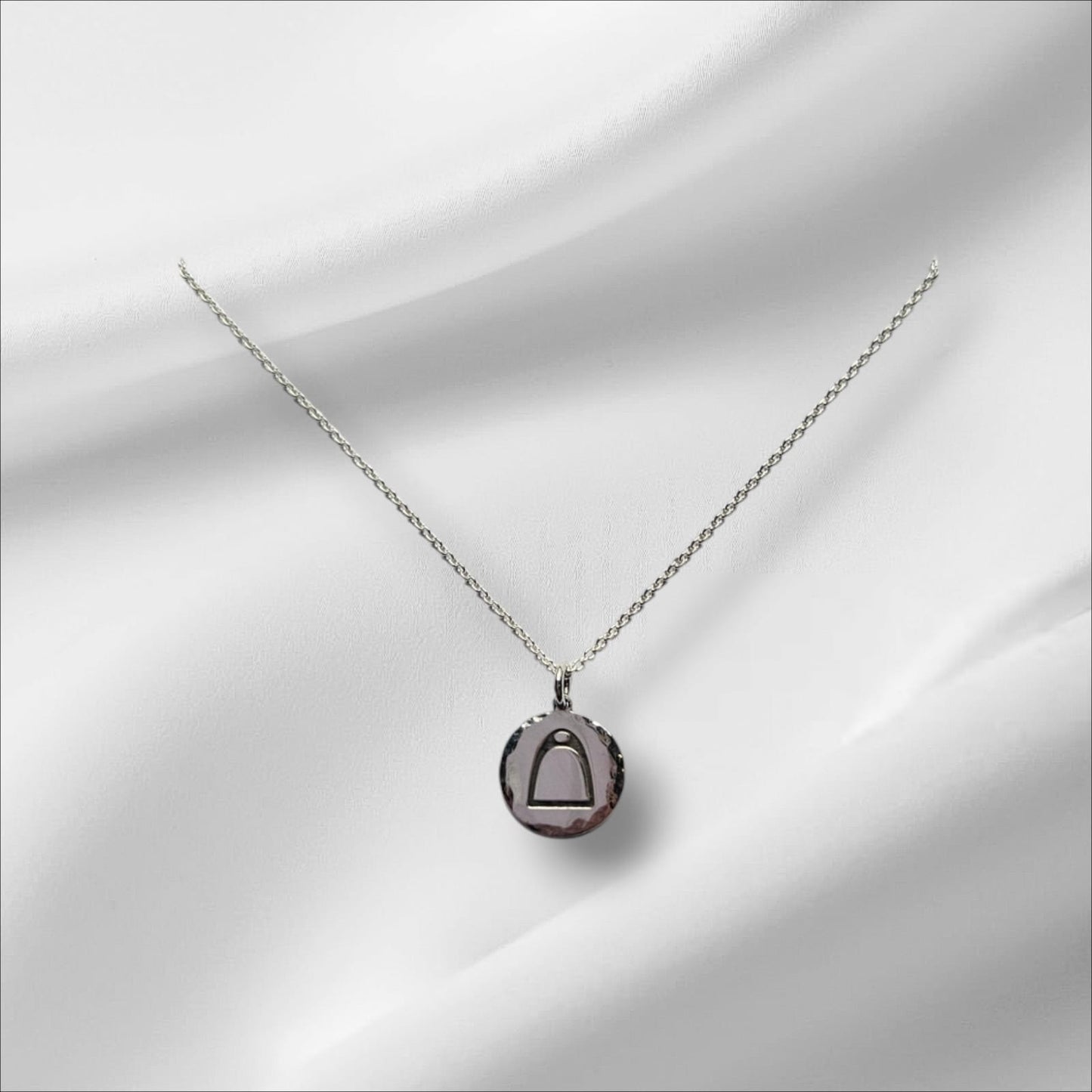 Argentium Silver Hammered Round Pendant with Stirrups Engraved on Sterling Silver Chain