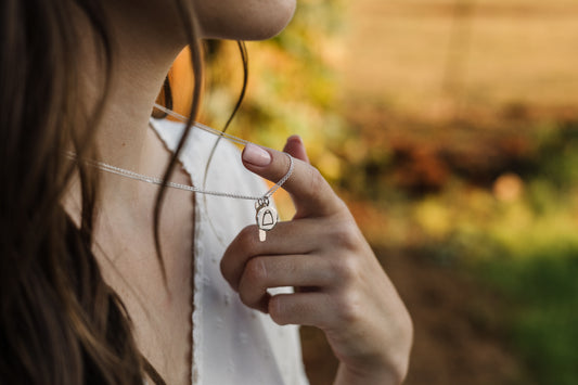 Argentium Silver Hammered Round Pendant with Stirrups Engraved on Sterling Silver Chain